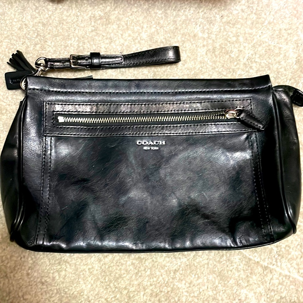 Coach Super cute detailing on this lightly used large wristlet black leather